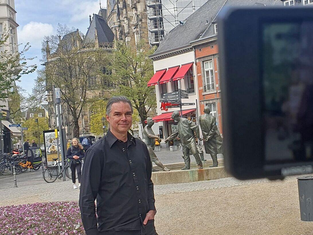 A man is being filmed